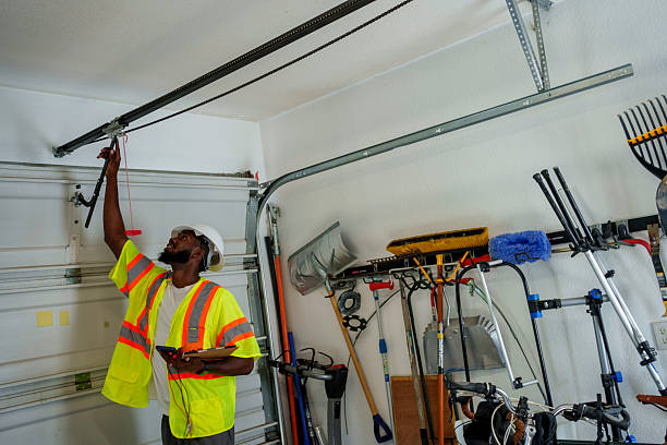 Professional Garage Door Panel Replacement technician working in Chetopa, KS